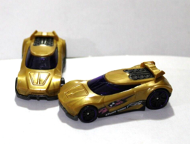 Pair of Mattel Hot Wheels 2014 Chicane Gold Stunt Team Die Cast Car - $14.80