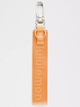LULULEMON NEVER LOST KEYCHAIN  ROCK MELON LIT ORANGE NWT FREE SHIP - $56.38
