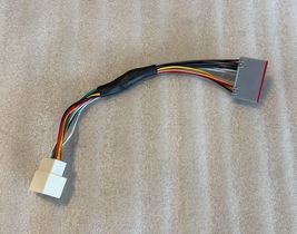 Wiring adapter. Put Ford phase 2 radio in world plug vehicle. Crown Vic PPV - $39.99