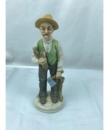 Vintage Figurines- Old Man with Hatchet - $7.70