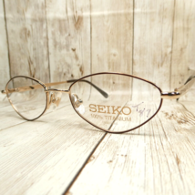 Seiko Gold Toned Titanium Eyeglasses FRAMES - T087 113 48-18-135 Japan NWOT - $64.30