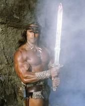 Arnold Schwarzenegger holds the gleaming sword as Conan The Barbarian poster - £23.44 GBP