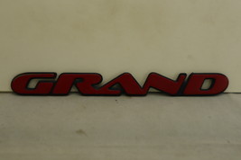 1997-2005 Pontiac “Grand” Prix Door Trunk Red Script Emblem OEM - $5.18