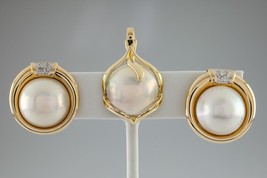 Authenticity Guarantee

Mabe Pearl and Diamond 14k Yellow Gold Earrings ... - €1.418,95 EUR