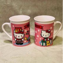 Vintage Hello Kitty Drummer Boy &amp; Opening Presents Pair of Christmas 12oz Mugs - £19.78 GBP