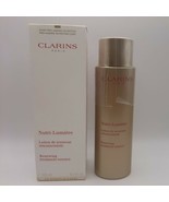 CLARINS Nutri Lumiere Renewing Treatment Essence 6.7oz SEAL CAME OFF - $596.89 MXN