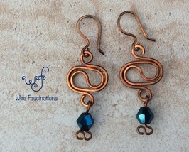 Handmade copper earrings: oval yin yang with metallic dark aqua bicone crystal - £14.11 GBP