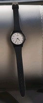 Casio Unisex Black Case White Dial Black Rubber Band New Battery - $207.79 MXN