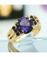 Gold Tone Ring with Large Solitaire Purple Round Cut Stone with AccentsS... - £8.59 GBP