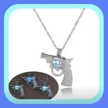 New Unique Solar Luminous Glow Pistol Blue Necklace Absolutely Beautiful - $10.00