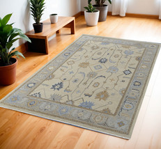 4' X 6' Gray Ivory and Blue Wool Floral Hand Knotted Area Rug With Fringe - $585.49