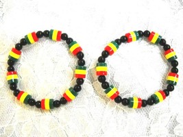 Set of 2 Rasta Red Yellow Green Acrylic Tube Beads on Stretch Elastic Br... - $128.68 MXN