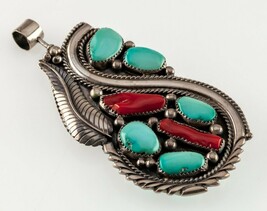 Rare! Navajo Sterling Turquoise & Coral Double-sided pendant 93 mm Long - $32,759.26 MXN Rare! Navajo Sterling Turquoise & Coral Double-sided pendant 93 mm Long - $32,759.26 MXN