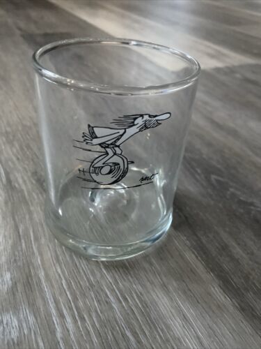 Primary image for Vintage BC Caveman on Wheel drinking glass By John Hart Marathon promotional