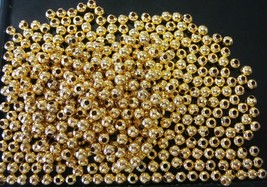500 Gold plated 4mm rnd spacer beads lrg hole fits on 1/2mm, 1mm leather... - £3.06 GBP