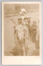 RPPC Girl On Donkey Beautiful Lace Cape And Bonnet Smirking Boy Postcard... - $12.95