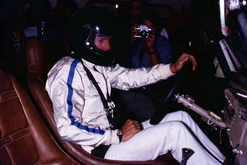 Steve McQueen at wheel of racing sports car in helmet being photographed 24x18 P - $23.99
