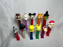 Vtg Pez Lot Looney Tunes Disney Witch Santa w/ Feet Mickey Tweety Garfield Marty - £23.88 GBP