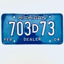 2004 United States Michigan Base Dealer License Plate 703D73 - $16.82