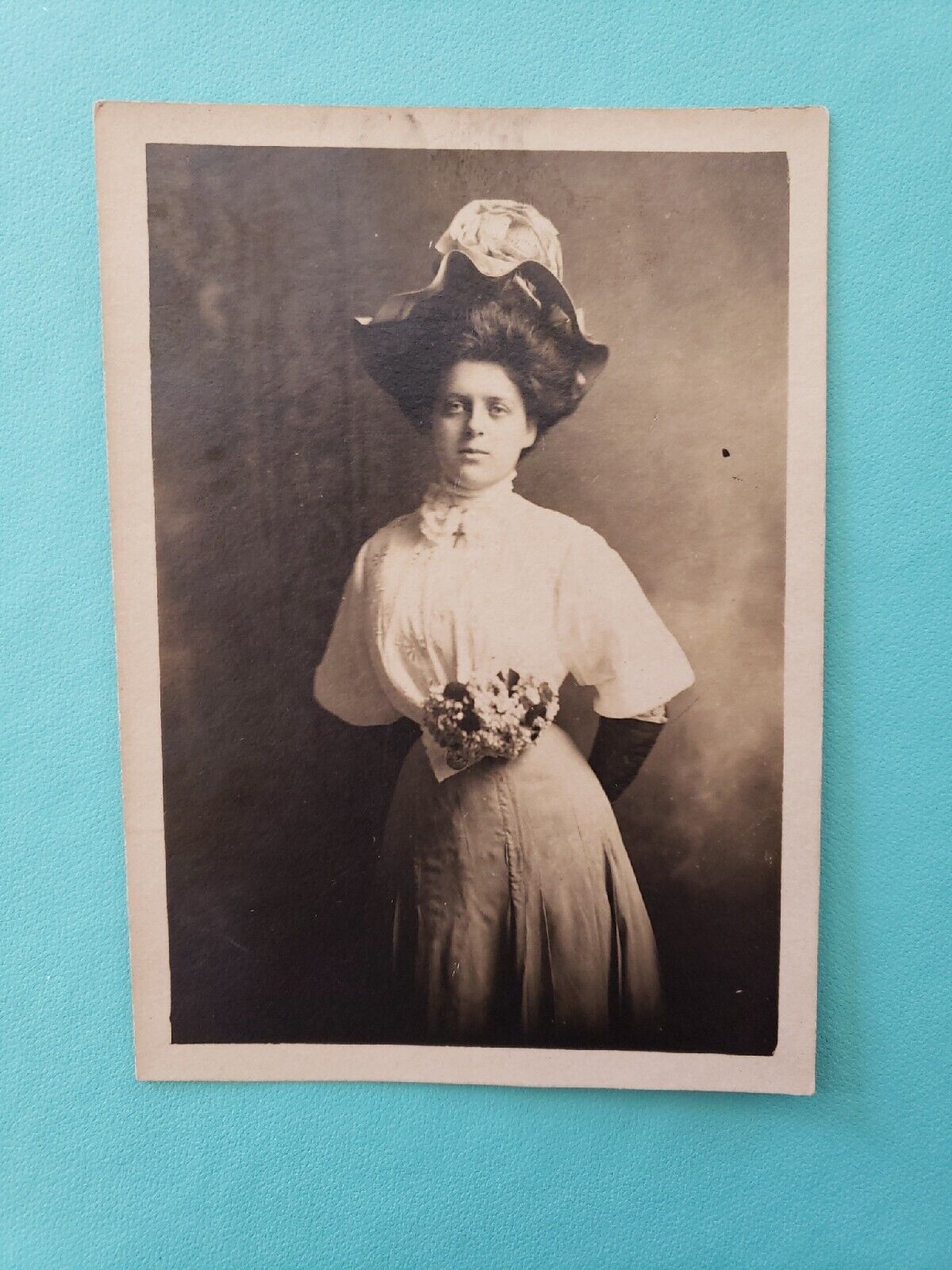 Primary image for RPPC Woman Posing in her Lovely Big Hat & corsage wearing a cross c1907