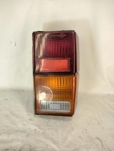 1984 to 1996 Jeep Cherokee Tail Light Left Drivers Side OEM - $466.85 MXN
