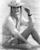 Bo derek sits in surf wearing beach hat 1979 movie 10 24x36 Poster - $29.99