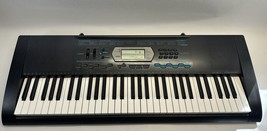 Casio CTK-2100 61-Key Electric Keyboard. 110 Songs, 150 Rhythms, 400 Tones. SEE - $56.09