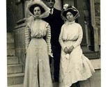 2 Women in Fancy Hats &amp; Dresses pose with Man Real Photo Postcard CYKO S... - £23.46 GBP