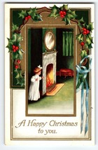 Happy Christmas Postcard Little Girl Looks At Fireplace Embossed Holly Vintage - £10.96 GBP