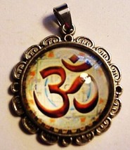 Om symbol pendant, handmade, white background with glass cover - $25.23