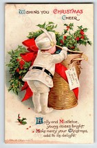 Christmas Postcard Ellen Clapsaddle Child Basket Germany 1187 Artist Signed - $19.80