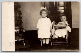 RPPC Darling Children Girl with Boy and Baby in Toy Walker Postcard H23 - $8.95