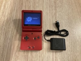Game Boy Advance SP Red + Charger + Monster Trucks TESTED NO MUSIC - $120.00