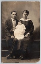 RPPC Sad Face Young Family with New Baby Portrait Postcard F26 - £7.02 GBP