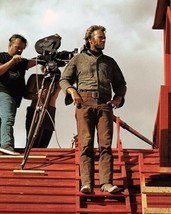 Clint Eastwood stands on red rooftop on High Plains Drifter set 1973 8x10 photo - £7.62 GBP