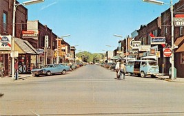 Spooner Wisconsin~Main STREET-PBR SIGN-VW VAN-PARKING METERS~1960s Postcard - £4.86 GBP