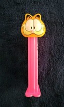 PEZ: GARFIELD w/Big Smile ~ Bright Pink Stem w/Feet ~ Patent 4.9 ~ Slove... - $1.99