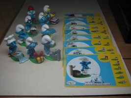 Kinder - 2010 NV129-137 Smurfs - complete set + 9 papers - surprise eggs - $13.00
