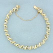 Designer Diamond Wrapped Ribbon Design Tennis Bracelet in 14k Yellow Gold - £1,981.20 GBP