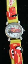 NOS child&#39;s Cars Lightning McQueen quartz wristwatch with 3-D yellow strap - $14.85