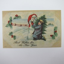 Postcard New Years Boy Gives Pipe to Snowman Tree Holly Berries Snow Antique - £7.98 GBP
