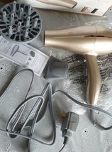Conair InfinitiPro Frizz-Free Collection Rose Gold Hair Dryer  Model 750N - $12.20