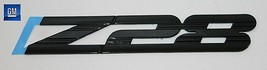 NEW GENUINE GM 93-02 Camaro Black Z28 Front Factory Fender Emblem - $56.38