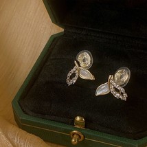 Natural Shell Zircon Fishtail Clip Earrings Female Light Hollow Leaf-shaped Hang - £14.50 GBP