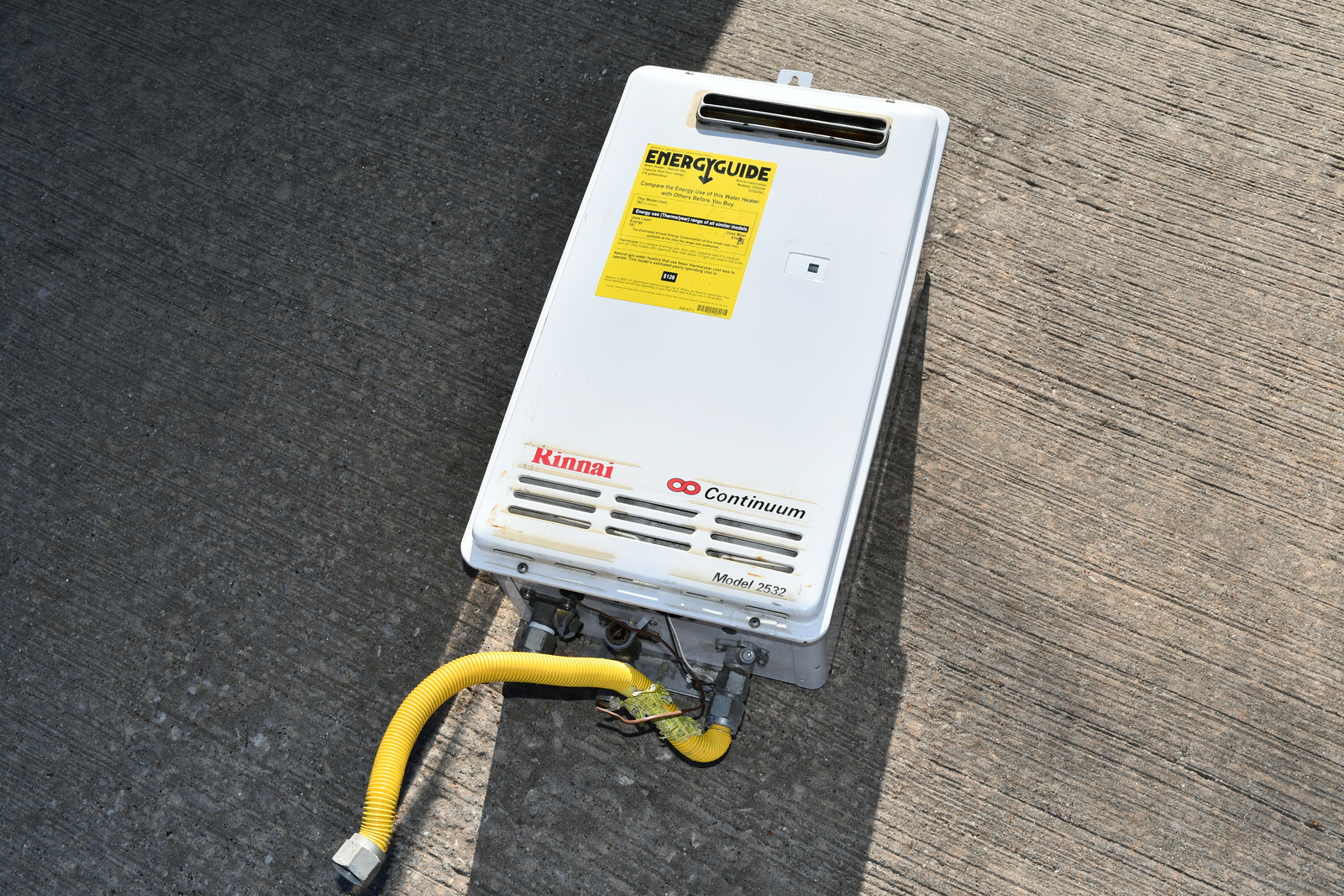 RINNAI REUV2532WUS TANKLESS OUTDOOR PROPANE GAS WATER HEATER AS IS