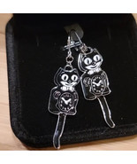 Black Kit-cat klock kat clock earrings black &amp; silver - $567.85 MXN