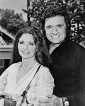 Johnny Cash poses with June Carter Cash with guitar 1978 Poster 16x20 inches - £19.60 GBP