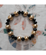 One used gold&amp;blk bracelet without charm - $11.30