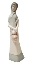 Woman figurine w/  basket Shawl - not a Lladro blue eyes spinster conservative - £12.62 GBP