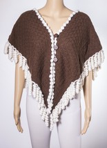 Knitted poncho with curly fringes  - £171.24 GBP